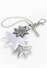 Lasessor Edelweiss heijastin - musta hopea - kukka - koruheijastin - laukkukoru - asusteet - IHANA Store